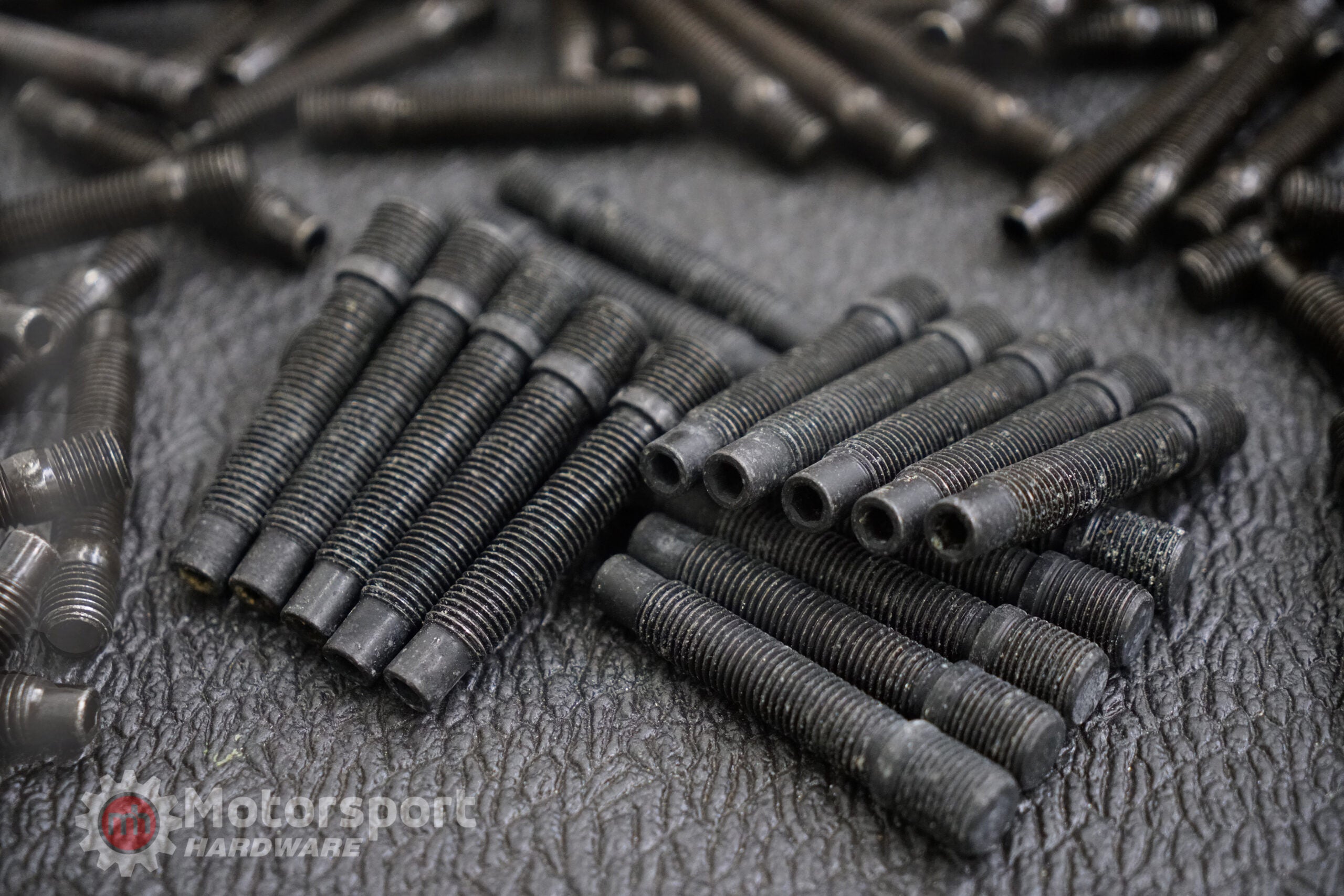 Motorsport Hardware - *ADAPTER / CONVERSION STUD 14×1.25-12×1.5* 78mm Black Bullet Nose Stud Kit